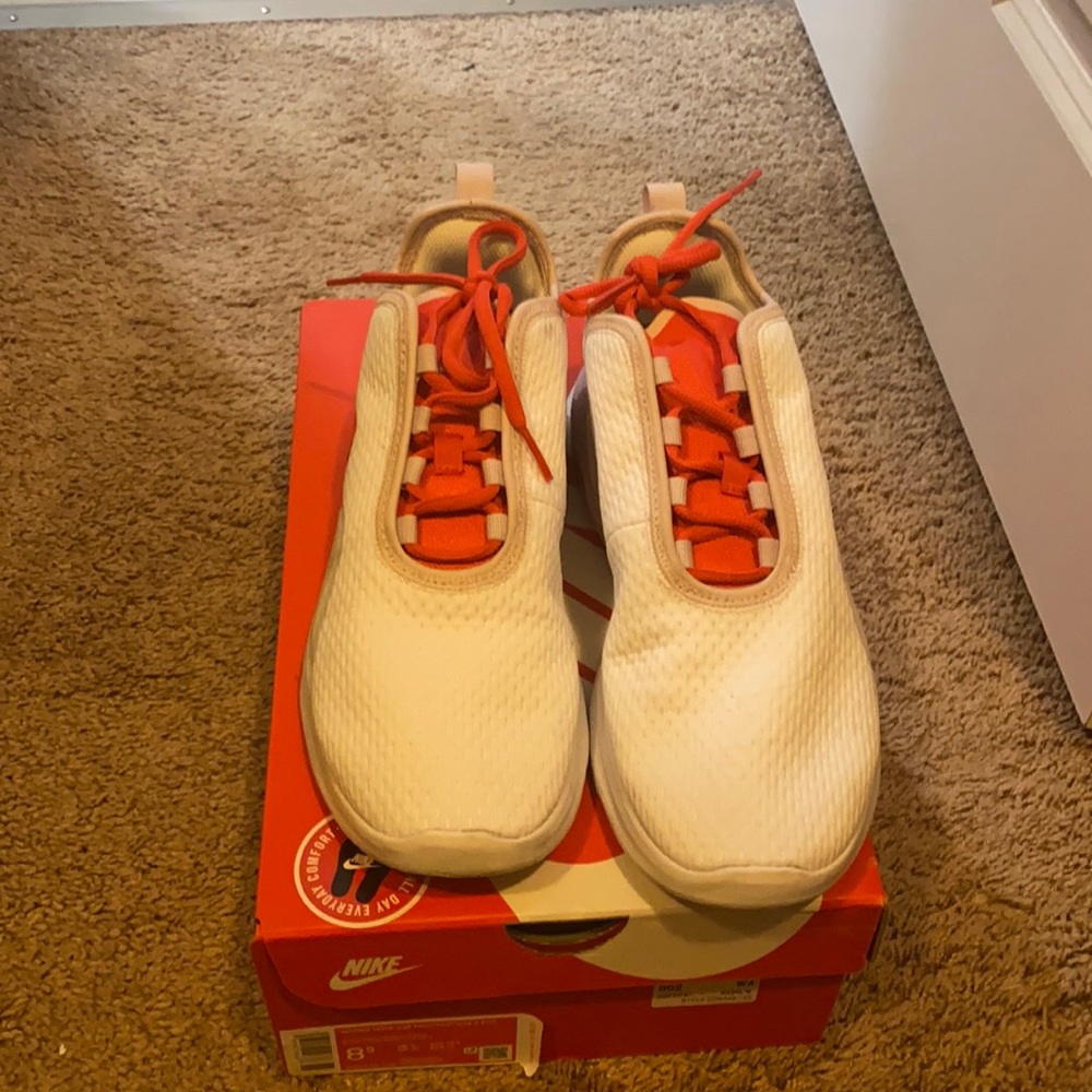 White and Pink Nike Shoes. Used a couple of times almost new